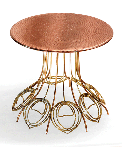 peacock table in copper top by sahil & sarthak